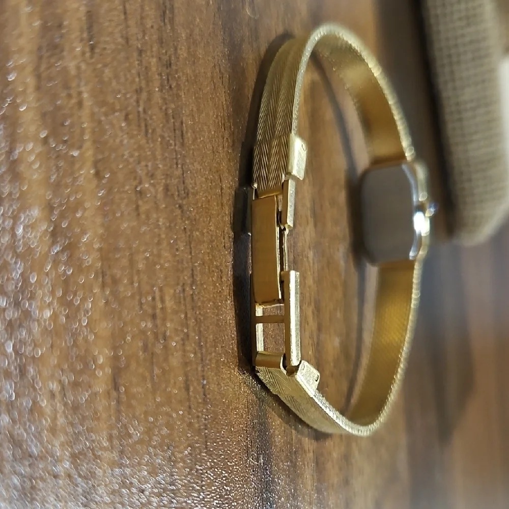 Vintage Lucian Piccard Goldtone Women's Watch with Crystal Detailing